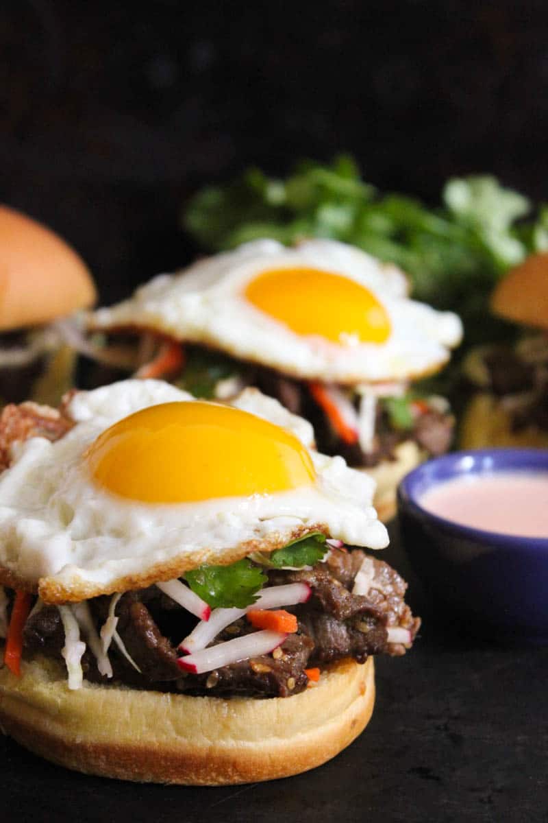 korean-steak-bulgogi-sandwiches-with-slaw-creamy-spicy-sauce-fried-eggs-4
