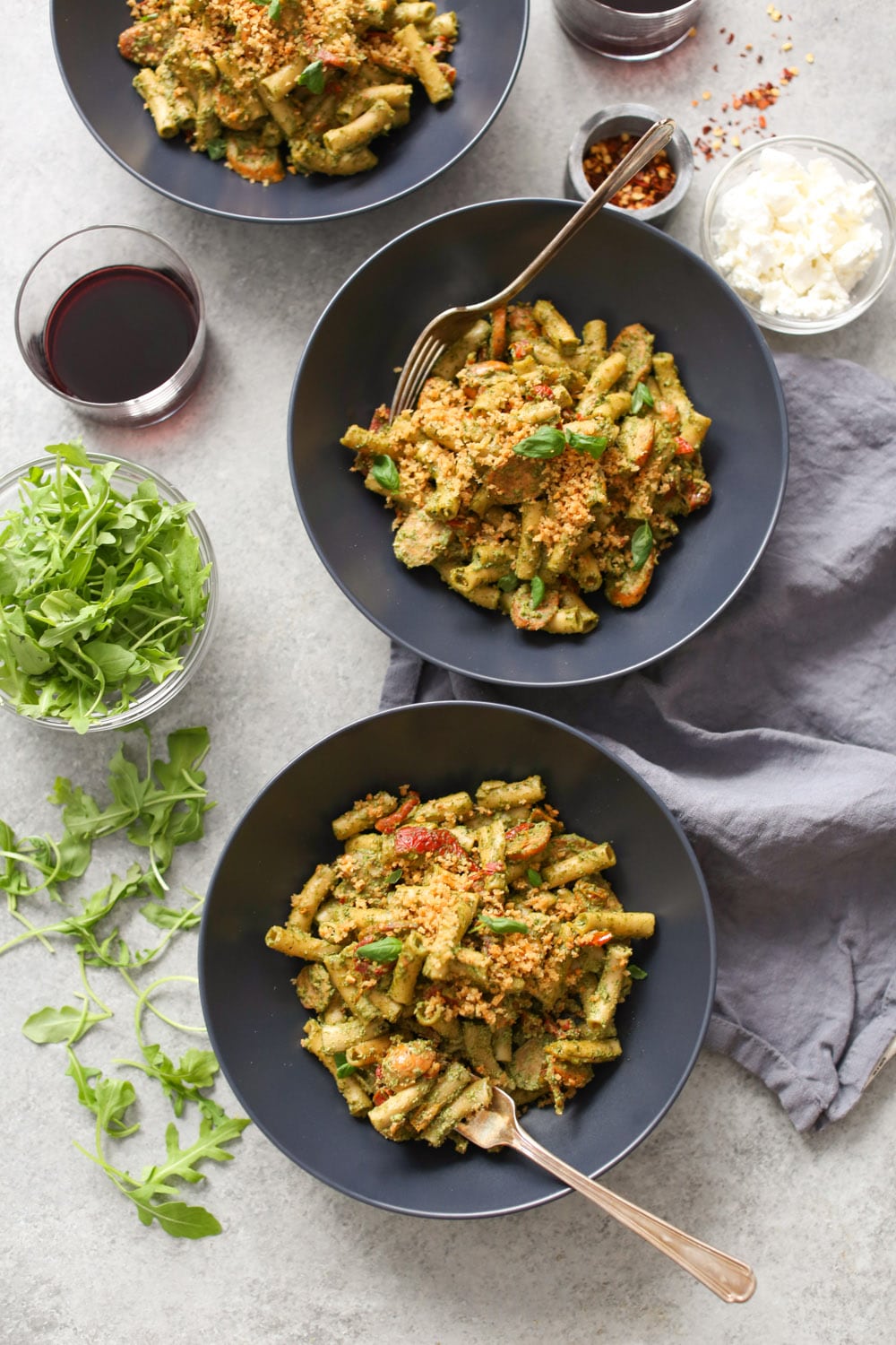 Sausage and Sun-Dried Tomato Pasta with Arugula-Goat Cheese Pesto