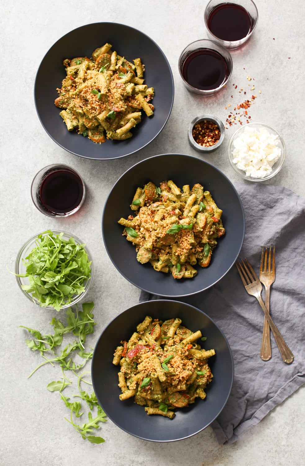 Sausage and Sun-Dried Tomato Pasta with Arugula-Goat Cheese Pesto
