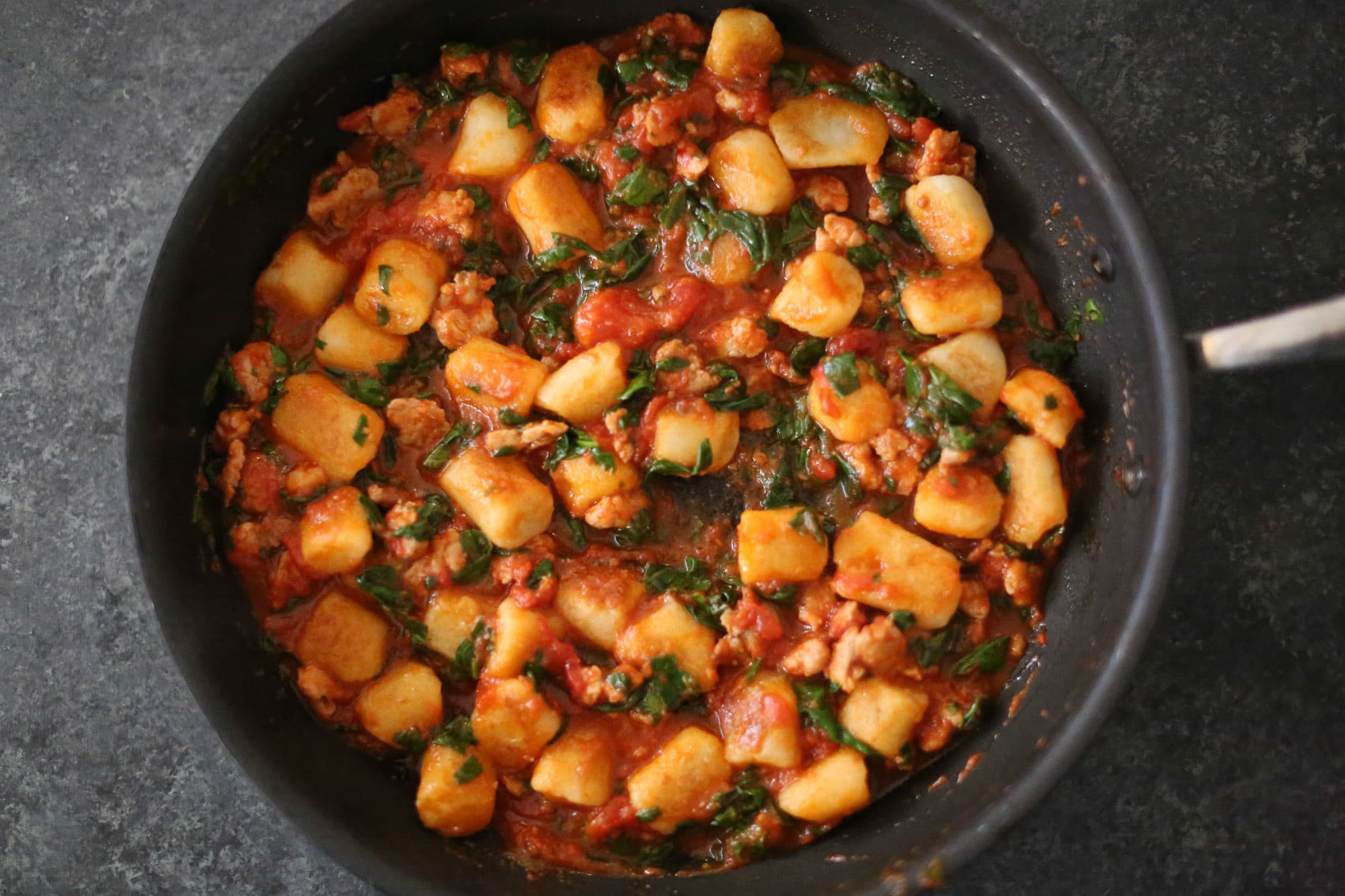 Skillet Cauliflower Gnocchi with Sausage and Spinach