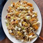 Overhead shot of fall couscous salad on a platter.